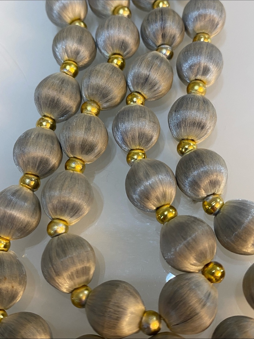 Grey silk beads